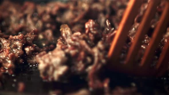 Super Slow Motion Mince Stirred with a Spatula on the Pan