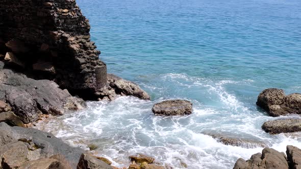 A seawall in urgent need of repair from climate change, rising tides, water damage and erosion along