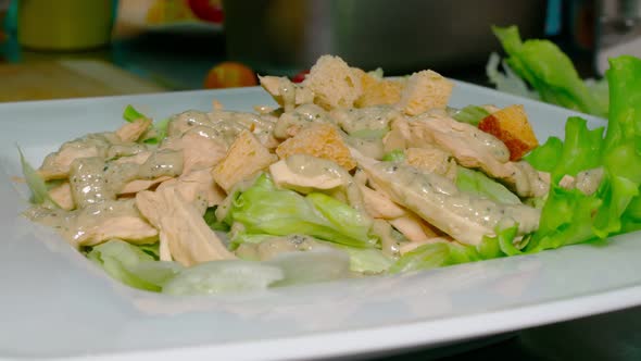 Caesar Salad is Served in the Restaurant Kitchen