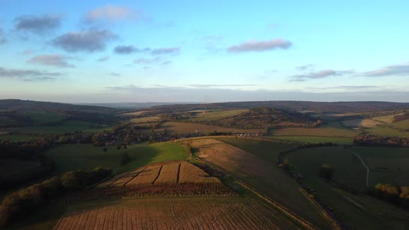 Drone shot rising over a beautiful English countryside landscape in summer