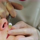 The Cosmetologist Makes Injections on the Client's Face in the Lip Area - VideoHive Item for Sale