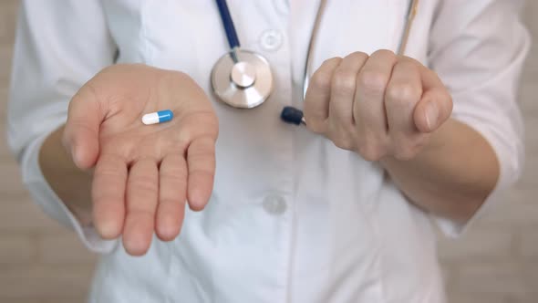 Doctor Choose Pills in Hands Indoor