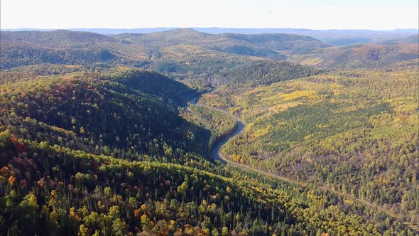 View of the Beautiful Mountain Scenery, Mountain River with a Drone View From Mount Aiger Russia