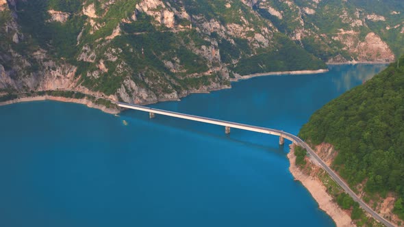 Aerial View on Bridge Over Lake Piva with Mountains of Canyon in Montenegro