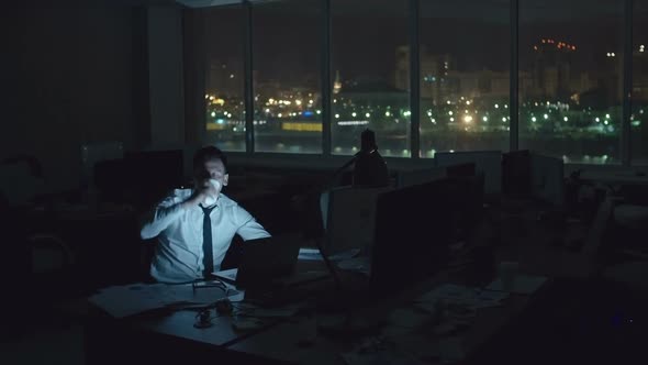 Working in Office at Night