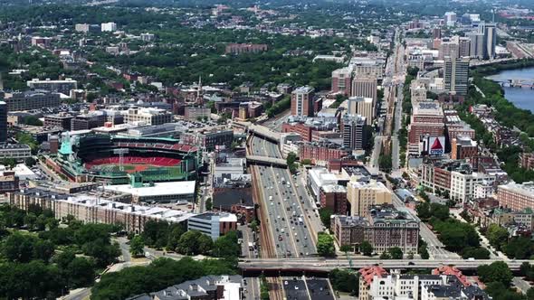 Aerial footage of Boston Fenway Park baseball stadium, Citgo Sign and Boston University