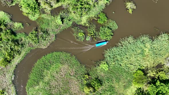 Boat sailing at Amazon River at Amazon Rainforest. Manaus Brazil.