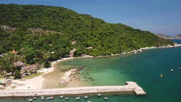 Aerial View of Idyllic Tropical Island with Pier, Basket Boats and Fishing Boats