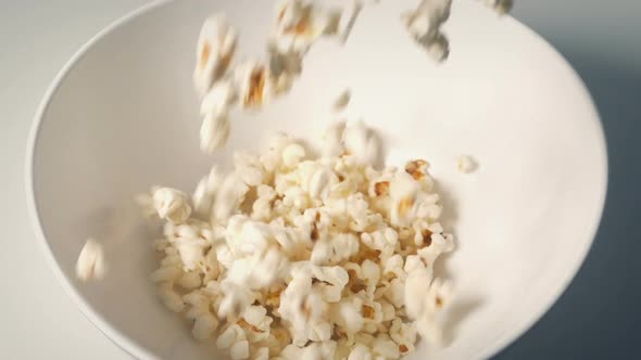 Popcorn Pours Into Bowl For Party