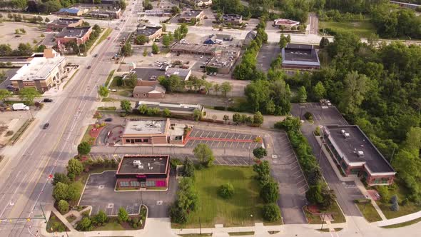 Aerial View Of Buildings At The Roadside Of Novi Highway In Michigan, USA.