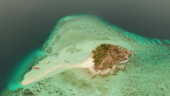 Small Torpic Island with a White Sandy Beach Top View