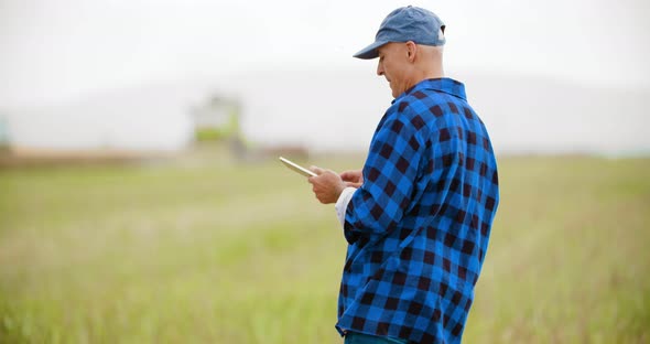 Farmer Working Field using Digital Tablet