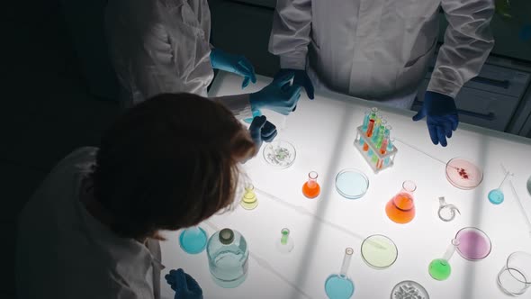 Carrying Out Chemistry Experiment alt