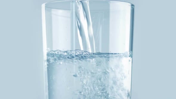 Moving Up A Glass As It Fills With Water