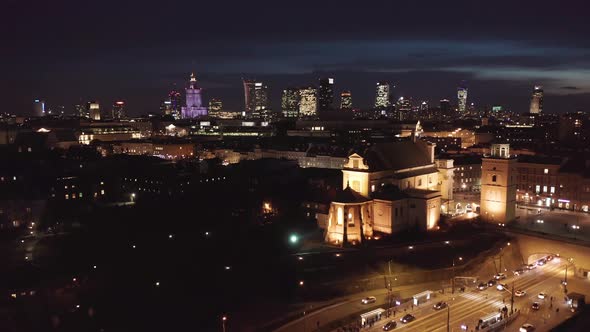 Aerial View of the Old City Night Warsaw with the Square and the Royal Palace in the Night Lighting