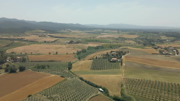 Aerial images of Tuscany in Italy cultivated fields summer, Aerial video over amazing Tuscany landsc