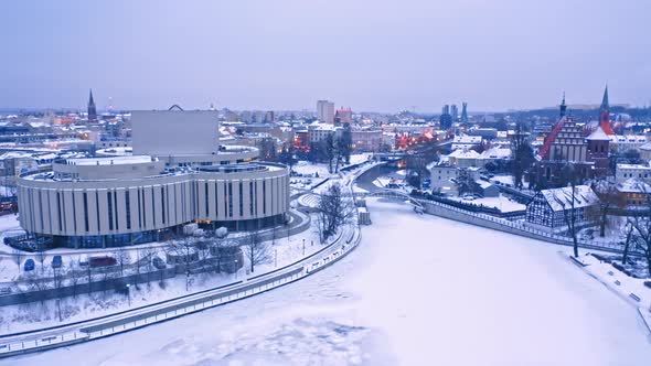 Snowy opera in Bydgoszcz in winter, aerial view of Poland