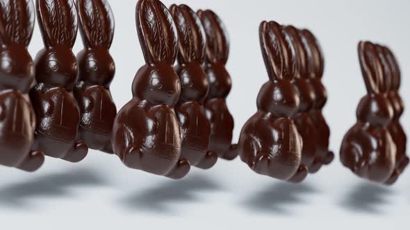 Loopable animation of cute chocolate jumping Easter bunnies.  Happy Easter.