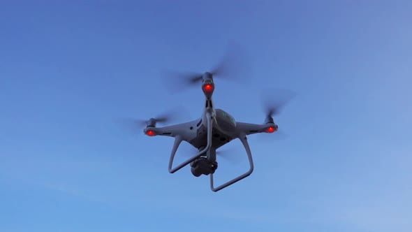 Drone Flying On Blue Sky