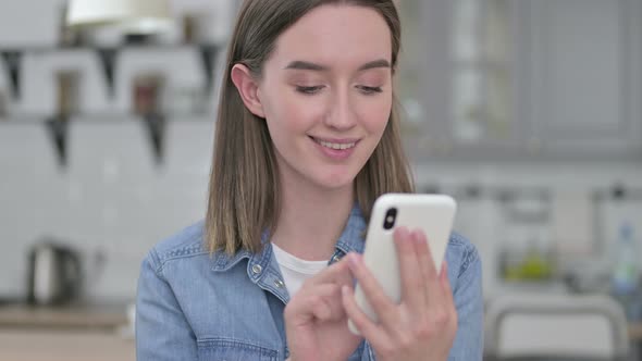 Portrait of Attractive Young Creative Woman Using Smartphone 