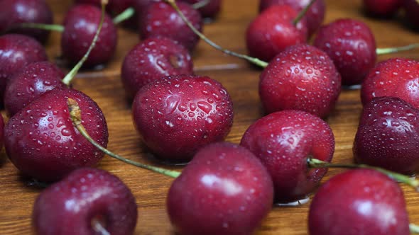 Juicy Berries on Brown Wooden Background