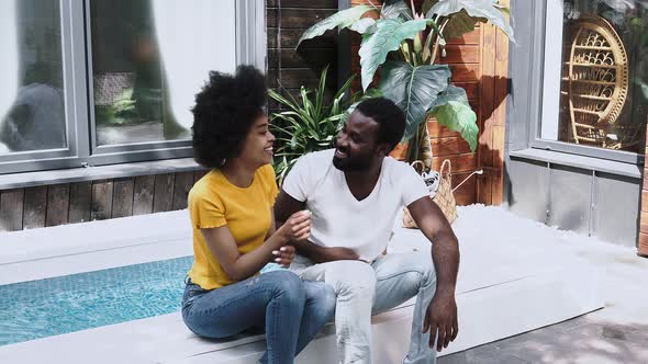 black couple conversating outdoor