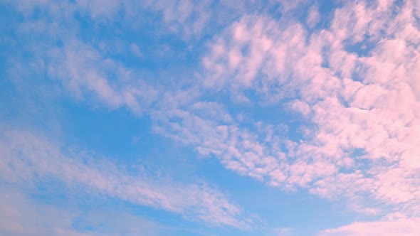 4K UHD : Time lapse of colorful sky during beautiful sunset. Romantic clouds. Summer sky