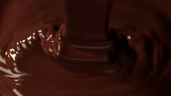 Super Slow Motion Shot of Pouring Meldet Chocolate at 1000Fps