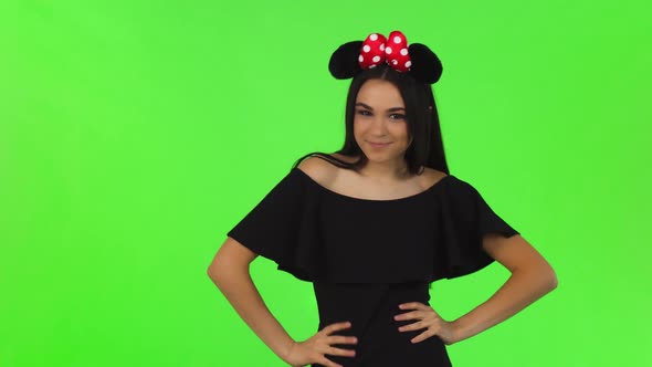 Beautiful Woman Wearing Fluffy Mouse Ears Posing Playfully