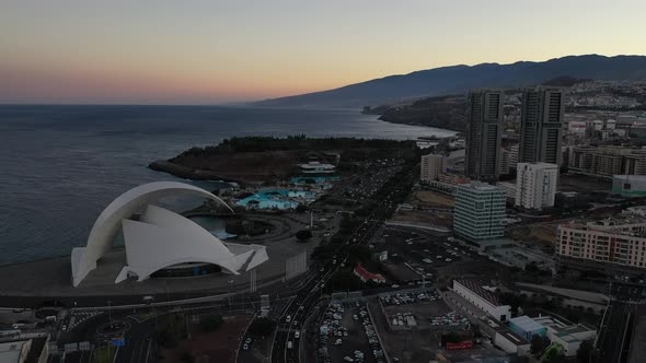 Auditorio de Tenerife at sunset in the heart of Santa Cruz de Tenerife near the port .