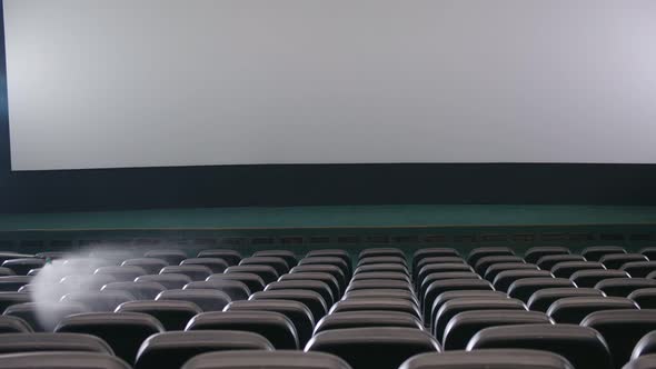 Man in Protective Suit Disinfect in Cinema Hall