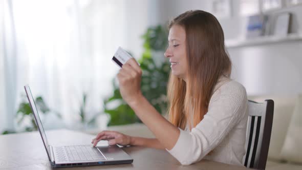 Beautiful Adult Woman With Red Hair With Credit Card