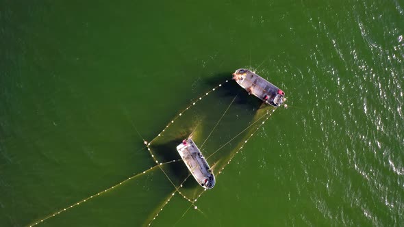 Aerial View to the Baltic Sea with the Fish Traps and Fishers