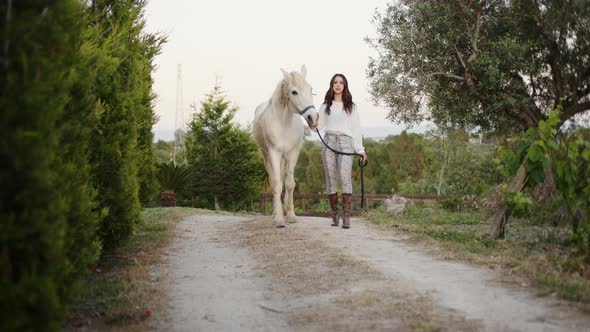 Walk with Girl in Boots and Her White Horse