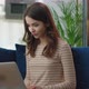 Attractive Happy Young Woman is Using Laptop at Home Office Getting Good News - VideoHive Item for Sale