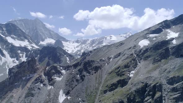 Aerial shot over barren mountain summitsArolla valley, Valais - Switzerland