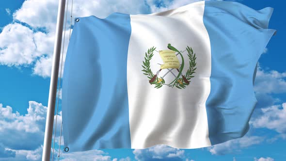 Waving Flag of Guatemala on Sky Background