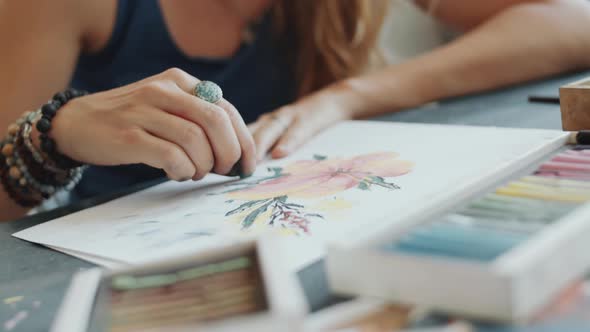 Female Artist Drawing Picture with Wax Crayons