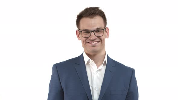 Handsome Lovely Male Entrepreneur in Blue Suit and Glasses Feeling Happy Smiling and Sighing Looking