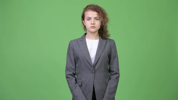 Young Beautiful Businesswoman with Curly Blond Hair