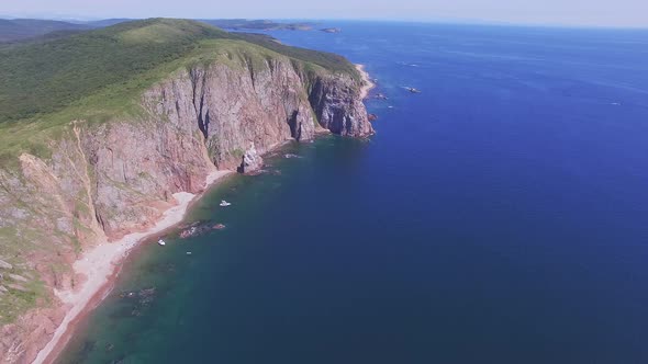 View From a Drone of the Coastline with a Rocky Coast and Hight Cliffs