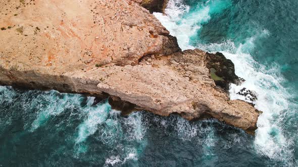 Aerial View of Anchor Bay From Drone in Mellieha Malta