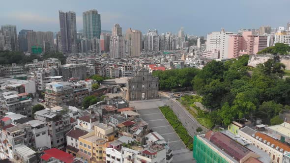 Wide rotating aerial view of famous Ruins of Saint Paul's, Macau