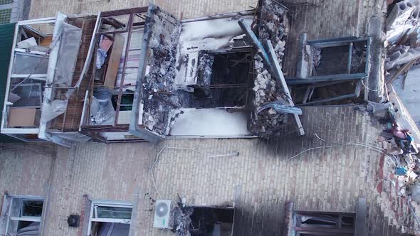 Vertical Video of the Consequences of the War in Ukraine  a Destroyed Residential Building