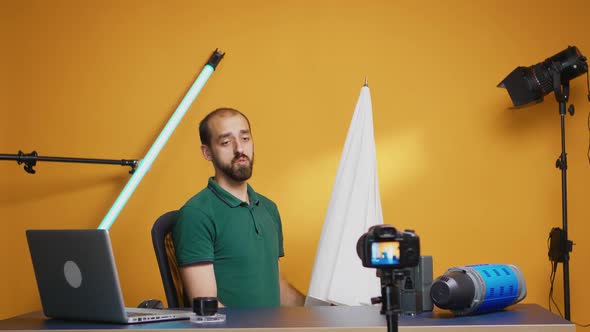 Photographer Holding White Umbrella