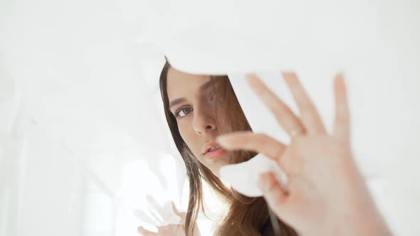 Young Beautiful Girl in White Decor