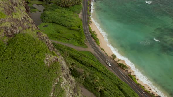 Aerial Drone title up of Kamehameha Highway, Oahu, Hawaii.