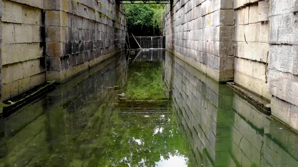 Drone flying through water locks in Toledo, OH.