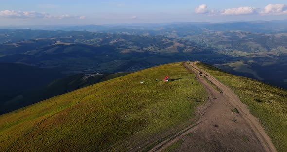 Paratroopers Train In The Mountains. Parachute Sport