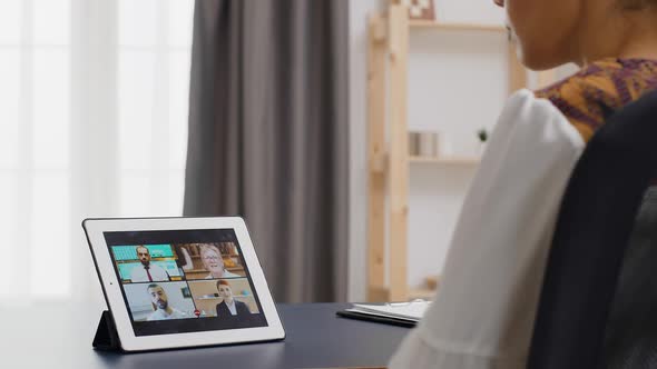 Woman in a Video Call on Tablet Computer